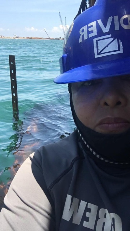 Crew at water level with DIVER helmet